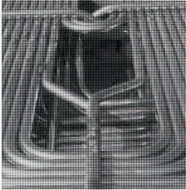 A black and white photograph showing a close-up of several metal tubes arranged in a bundle. Some tubes are bent into a U-shape, acting as spacers or guides between the main bundle tubes. The surface of the tubes appears slightly reflective and metallic.