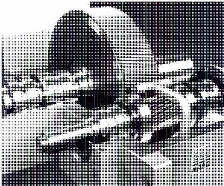 Internal view of a speed reduction gearbox showing gears and shafts.