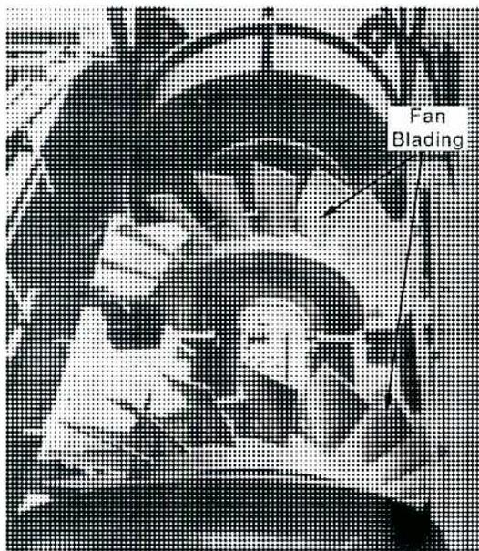 Figure 60: Axial Flow Fan Blades. A close-up photograph of the internal components of an axial flow fan, specifically the fan blading. The image shows multiple rows of blades, with a label 'Fan Blading' pointing to one of the rows.