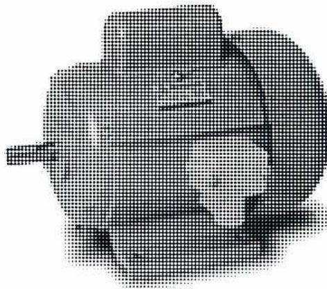 Figure 31: Capacitor-start Motor. A black and white photograph showing the top of a motor with a cylindrical capacitor mounted on it.
