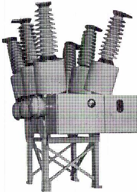 A black and white photograph of an outdoor SF6 circuit breaker. The breaker is mounted on a tall, open-frame metal structure. It features three distinct vertical interrupting modules, one for each phase, which are connected to a horizontal busbar at the top. The base of the structure is supported by a cross-braced frame.